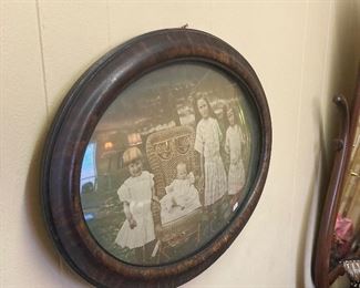 Large convex glass in old frame 