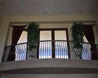 This curved railing is for sale.  Ficus trees are for sale. Curtains and rods are for sale. 