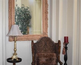 Mirror, occasional chair,  small side table, lamp, tall candlestick.