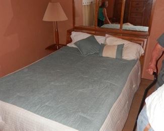 Queen bed with sliding door headboard and mirror $75 Call (760) 975-5483