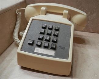 Vintage GTE touch-tone wired desk phone....ivory color...of course it works....its American made