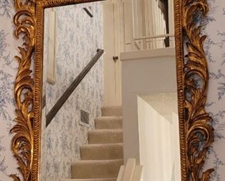 Large hand carved and gilt mirror