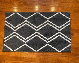 Black and white floor mat,  $8