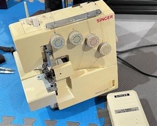 Singer Serger with Lay-in Threading, 3 and 4 Thread Convertible with Differential Feed, $58