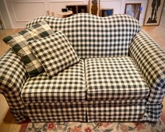 Green and white plaid loveseat