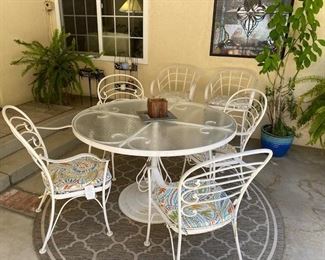 Iron patio set & lots of outdoor plants