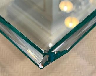 detail - please note the chip in the glass