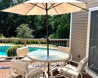 Item 98:  Tropitone Patio Set (table, 4 armchairs, umbrella):   $475                                                                                                 Table - 48" x 28.5"                                                                                            Armchairs - 24"l x 18.5"w x 29.5"h