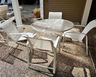 Item 102:  Brown Jordan Patio Table & 4 Armchairs: $475                                                                                                          Table - 48" x 27"                                                                                                 Armchairs - 24.5"l x 18"w x 32"h