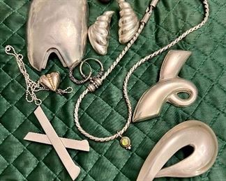 Sterling Silver pins, necklaces, bracelets are all priced at the sale!