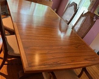 Beautiful formal dining table w/6 cane-backed upholstered-seat chairs