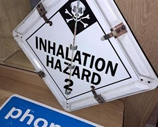 "Phone" and "Inhalation Hazard" signs