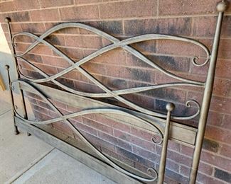 Several metal king size bed sets.