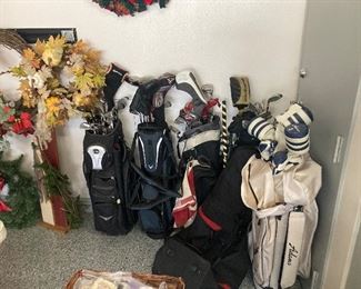Large assortment of golf clubs