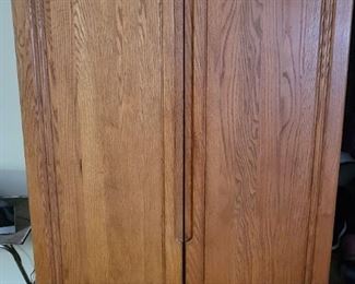 Armoire sold only with rest of bedroom suite.