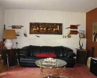 Black Leather Sofa, Lamps, Art, Sword, Gun, TV, Art, Canon, Sail Boats