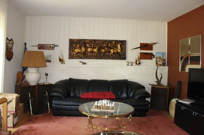 Black Leather Sofa, Lamps, Art, Sword, Gun, TV, Art, Canon, Sail Boats