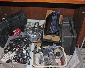 Electrical and computer and Phone Cords, Brief Cases More