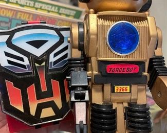 vintage toy robot and transformer toy  