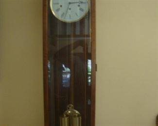 Howard Miller grandmother clock, keeps time