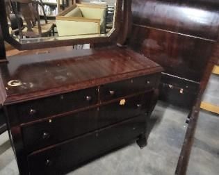 Antique sleigh bed and mirrored dresser 