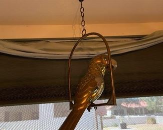 Hanging Bird And Mirror