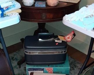 Vintage suitcases and drum table