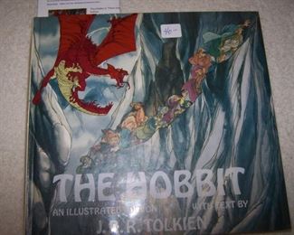THE "HOBBIT" WITH PLASTIC COVER WITH RED DRAGON