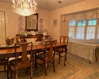 Dining table, chairs, crystal, silver plate, buffet with mirror