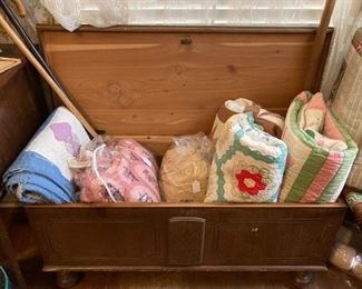 old quilts and blanket chest