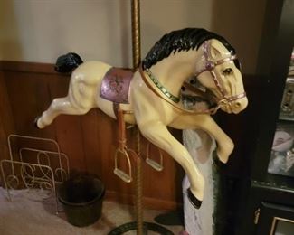 TURN OF THE CENTURY CHILDS SCALE CAST IRON CAROUSEL HORSE. STAND WAS ADDED TO HORSE WHEN IT WAS RESTORED IN 1994 BY CHANCE INDUSTRIES