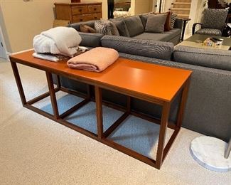 Orange console with walnut wood base from NYC design showroom. Excellent condition. 
72x24x26
Price: $600