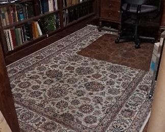 6x9 Persian rug and library of books