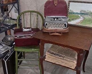 Vintage typewriter, suitcases
