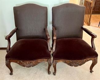Moretti's Design Collection Pair of Lovely Upholstered Arm Chairs in a beautiful shade of chocolate brown. 
