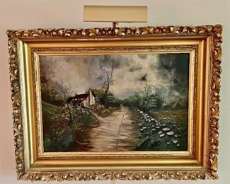 This Scenic Original Oil on Canvas Painting is set in a gilded frame. The frame does have wear including chips and paint loss. This art depicts a lovely cottage in a beautiful country setting. This original art measures 23x31 inches and the artist is unknown.