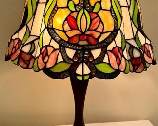 This Stunning Tiffany Style Lamp measures 24 inches tall. A truly beautiful lamp!