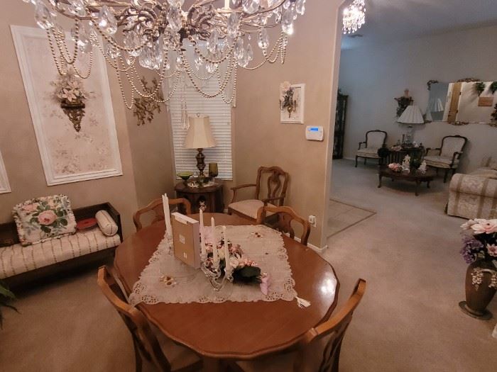 Matching dining room set with leaf, 6 chairs, buffet, and china hutch.