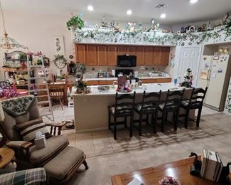 Four tall bar chairs.