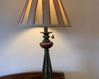#142 Lamp with pleated shade, 32” tall $25