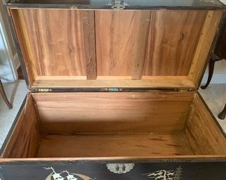 #118 Vintage Oriental black lacquer trunk with Mother of Pearl inlay; 41”w x 20”d x 23”h   $185