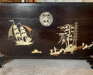 #118 Vintage Oriental black lacquer trunk with Mother of Pearl inlay; 41”w x 20”d x 23”h   $185