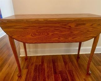 #133 Oak drop leaf table $85