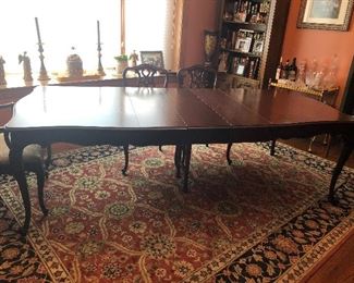 Antique dining room table, table pads, 2 captains chairs, 4 side chairs and 3 leaves. Table measures 65" with (3) 12" leaves - $500    Table and chairs located in Berwyn.   Call or text Joanne at 708-890-4890 to schedule your appointment to view and purchase now!