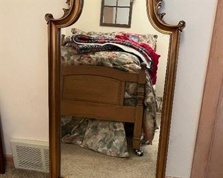 Gold framed wall mirror