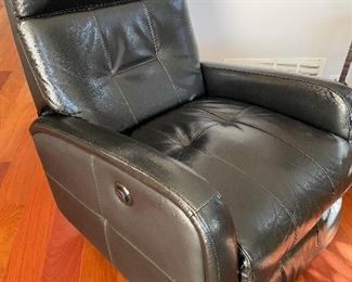 Motorized black leather recliner 29"W x 32"D x 39"H - $250   Item located in St. Charles.  Call or text Joanne at 708-890-4890 to view and purchase!