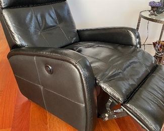 Motorized black leather recliner 29"W x 32"D x 39"H - $250   Item located in St. Charles.  Call or text Joanne at 708-890-4890 to view and purchase!
