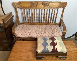 Includes a carved wood bench with turned spindles and woven wicker seat and floral cushion seat, H 39"x W 43"x D 18". Also comes with small wood footstool with Southwestern design fabric, H 6.5"x W 15.5"x D 12.5", appears to have been reupholstered in the past. Both have scratches, scuffs and nicks in the wood