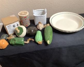 Includes (1) Longaberger Holly 10" pie plate, (8) ceramic pieces of veggies, (1) Prestige Place ceramic woven basket, H 9"x W 4"x D 4", and Light Your Way soy candle, new in box.