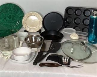 ncludes (2) Calphalon 8" cake pans, (1) Calphalon muffin tray, (1) Neiman Marcus 12" plate, (8) Neiman Marcus 6.5" plates, (1) chefs choice knife sharpener, (2) spatulas, (2) pot lids, and more. Dishes may have some chips and cracks but otherwise in good condition.